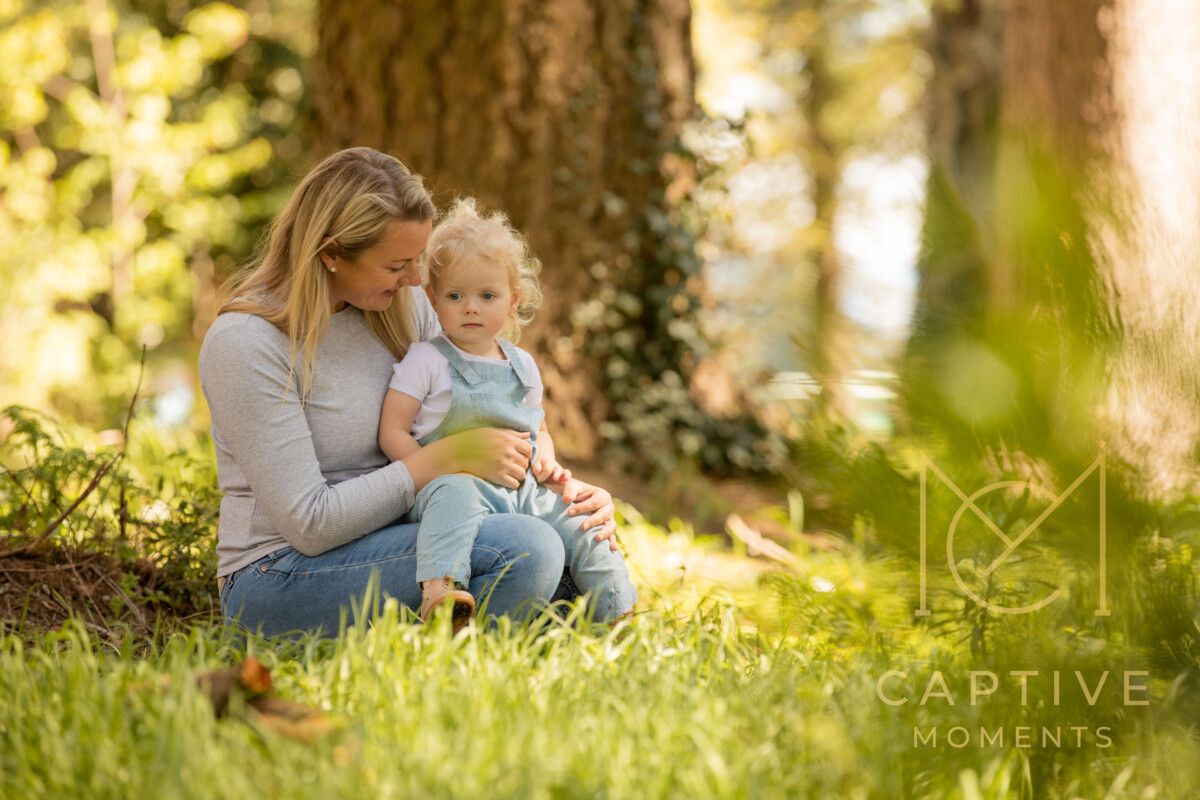 Family photography mother holding daughter